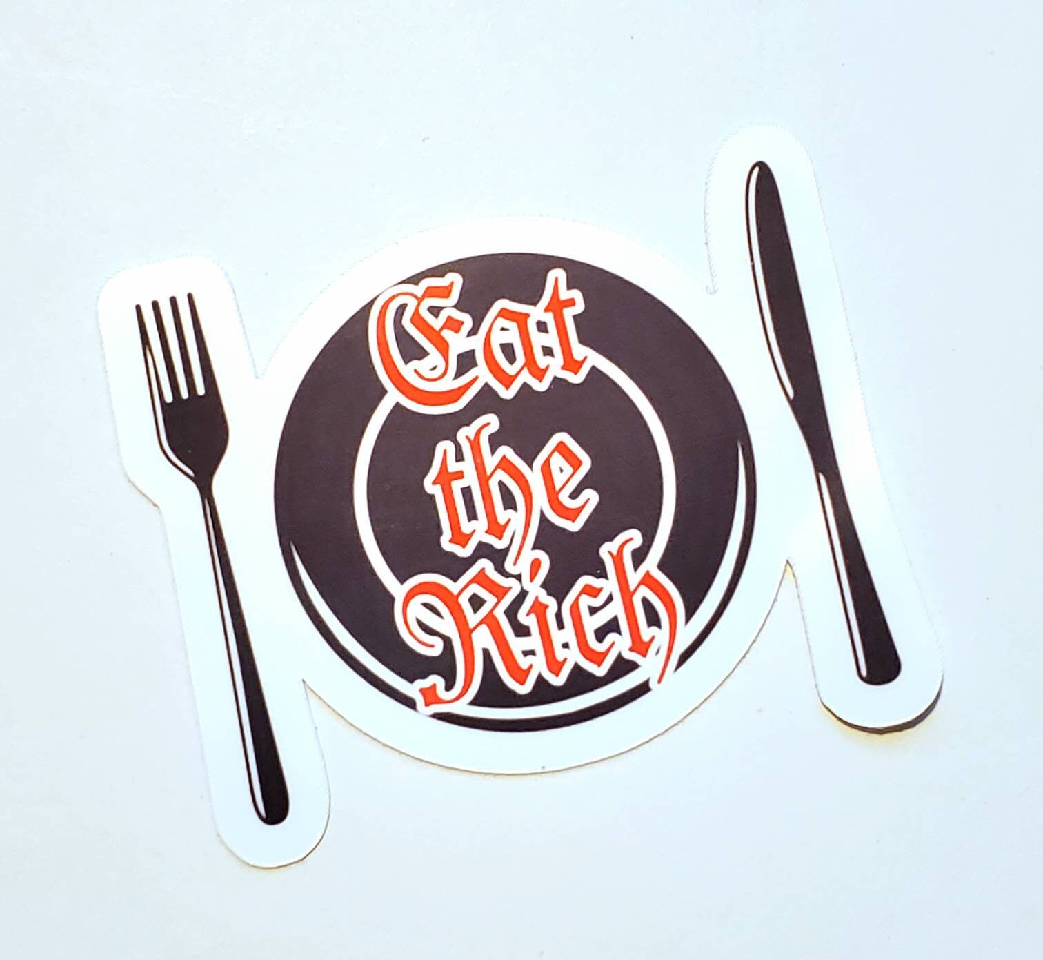 Eat the Rich Glossy Vinyl Sticker - 2" x 1.8"