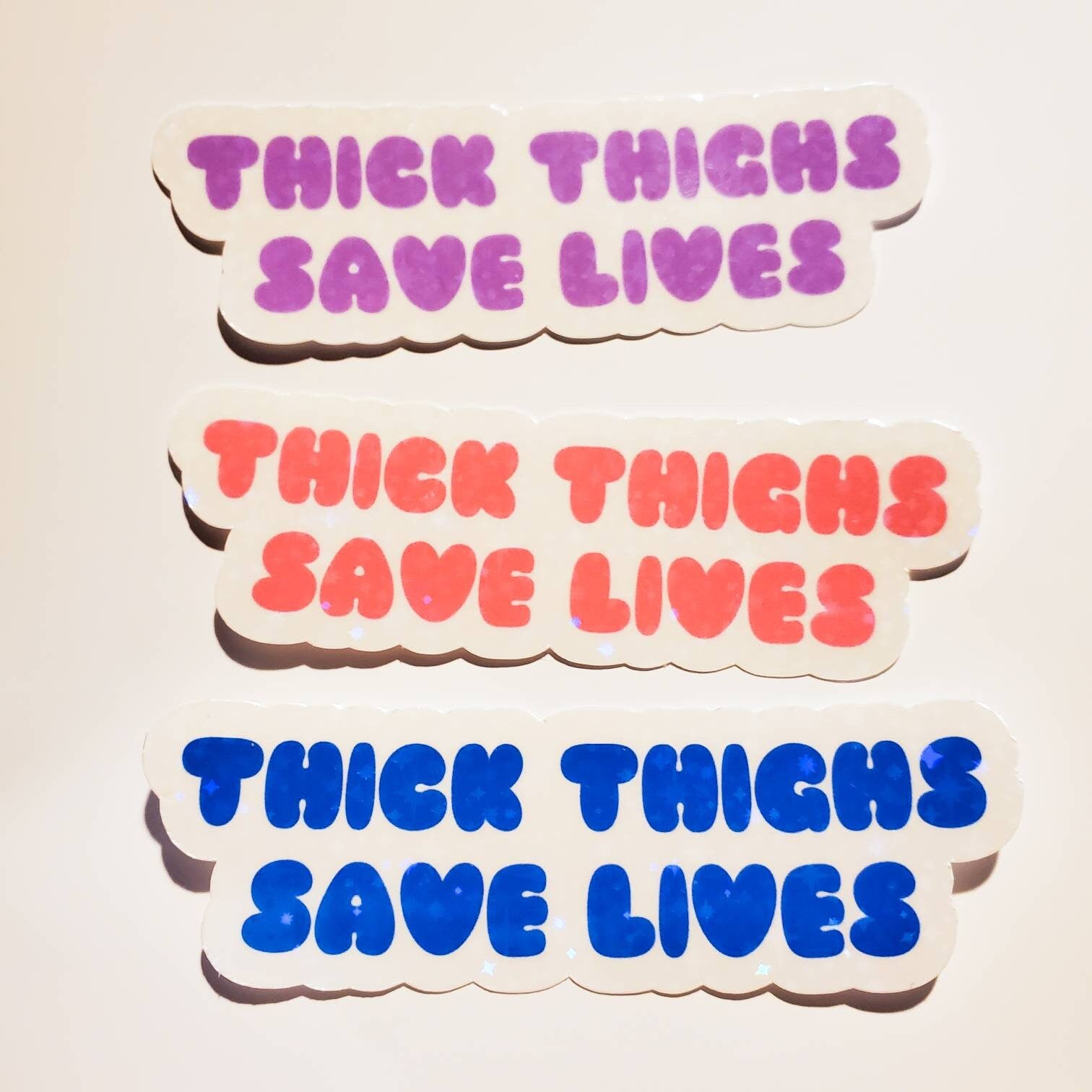 Thick Thighs Save Lives Sticker / holographic sparkles glossy / pink lavender blue / 3.8" x 1.2" / stickers decal journal planner laptop