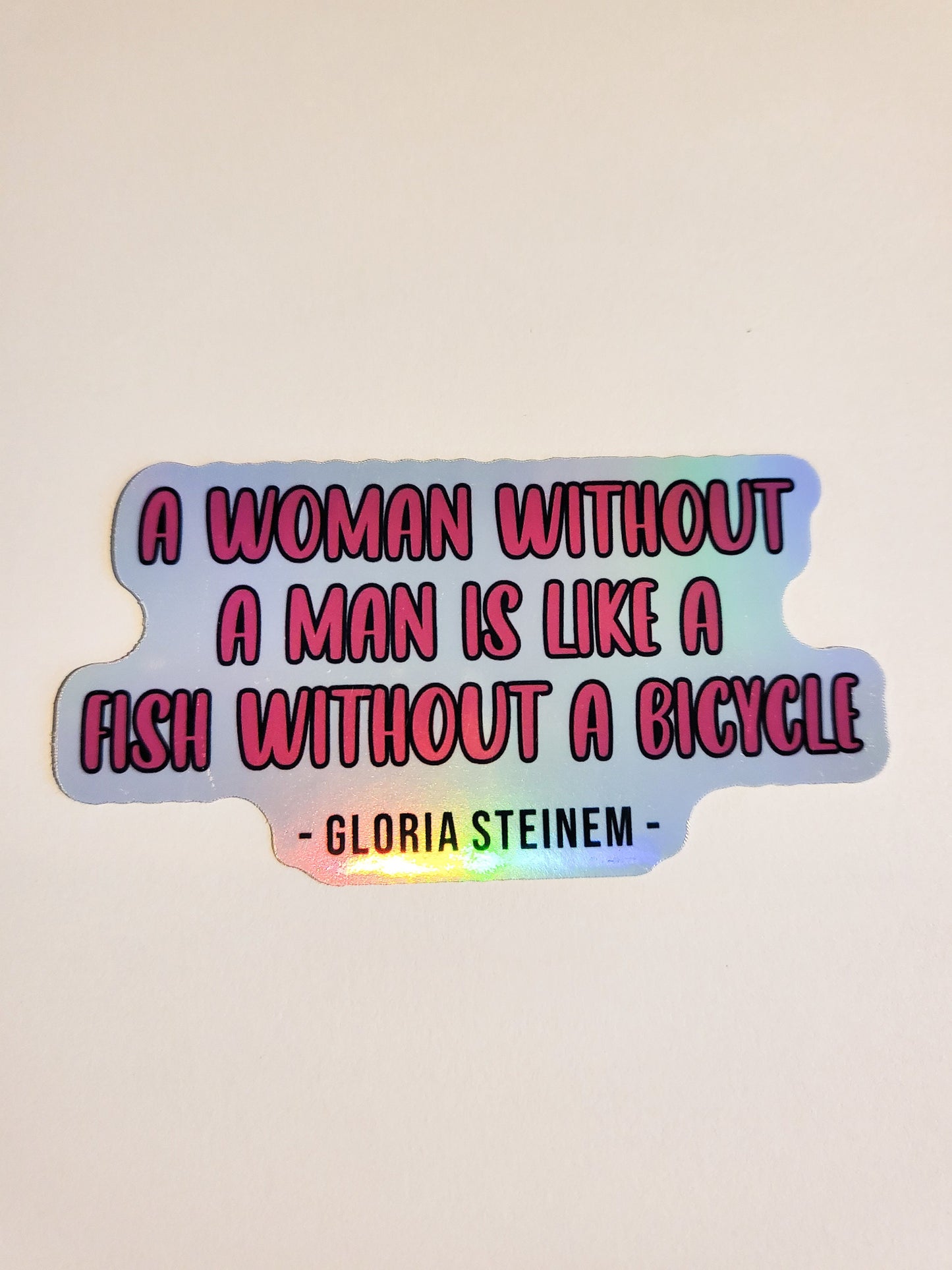 Gloria Steinem Quote Sticker -Glossy or Holographic 3.3" x 1.7"- stickers decal feminist feminism activist woman without man fish bicycle